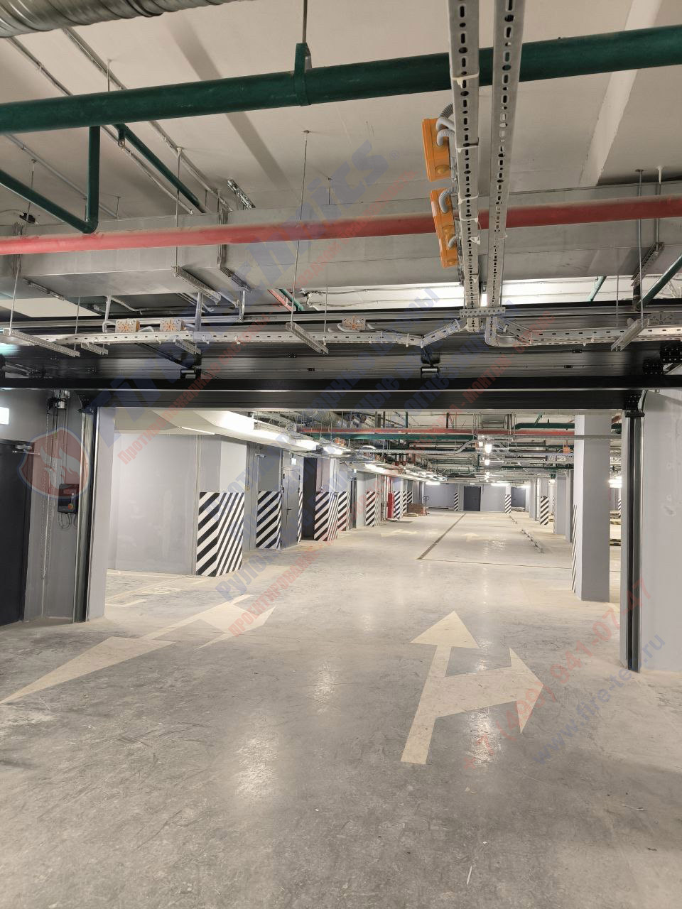 Секционные противопожарные ворота FireTechnics-S EI60 в паркинге ЖК